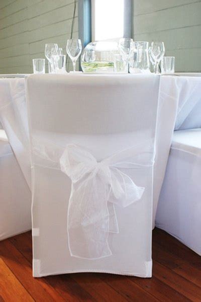 This chair sash works for chiavari chairs, banquet chairs, and folding chairs for the perfect wedding ceremony chair. DIY Chair Sashes | HomeSteady
