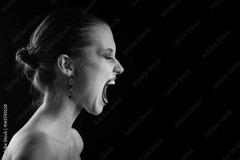 Angry Nude Girl Screaming On Black Background Monochrome Stock Photo