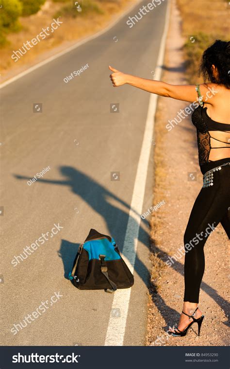 sexy hitchhiker trying her luck on foto stock 84953290 shutterstock