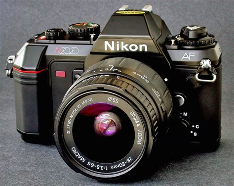 All lenses attach to the camera using some sort of locking lens mount. Nikon AF Auto-Focus N2020 35mm SLR Camera Use With Nikkor ...