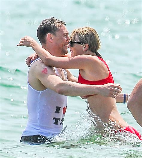 Taylor Swift Kisses Tom Hiddleston During July 4th Party