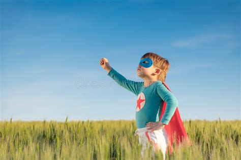Superhero Child Playing Outdoor In Green Field Stock Image Image Of