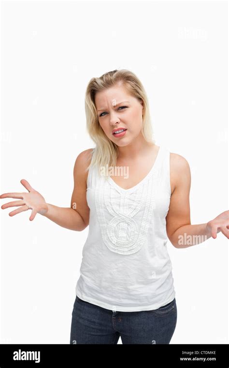 Upset Blonde Woman Extending Her Arms Stock Photo Alamy