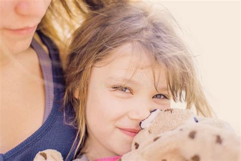 Portrait Of A Pretty Little Girl Hugging Her Mom Stock Image Image Of