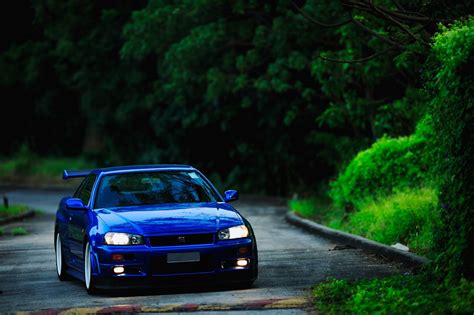 Maybe you would like to learn more about one of these? blue cars nissan front view nissan skyline gtr r34 nissan ...