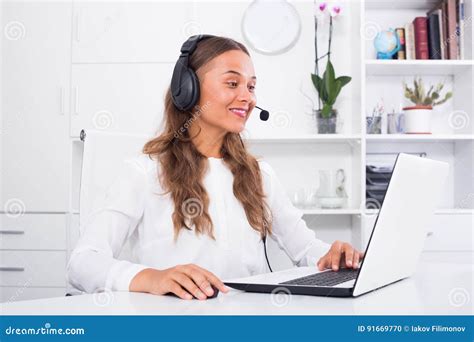 Young Woman Talking With Customer Using Headset Stock Photo Image Of