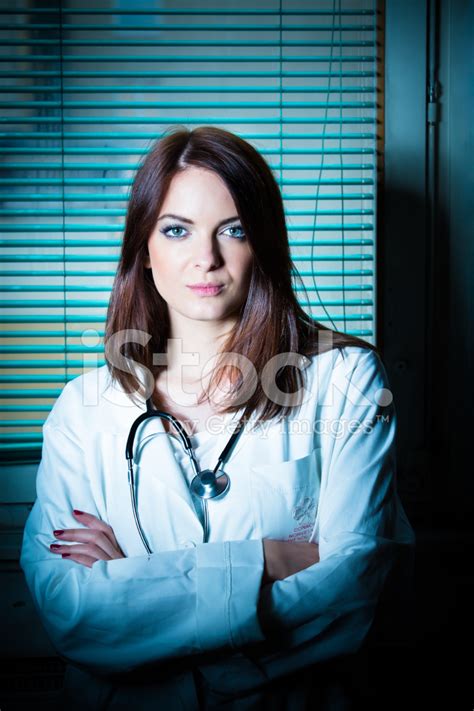 Young Beautiful Brunette Female Doctor In The Clinic Portrait Stock