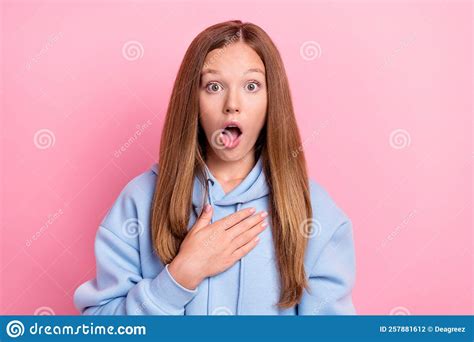 Closeup Photo Of Young Funny Excited Shocked Little Schoolgirl Wear Blue Hoodie Touch Chest