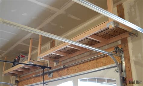 The wooden overhead garage storage shelves are designed to fit into that unused space above the garage doors (you need 16 in. Suspended Garage Storage - DIY Done Right