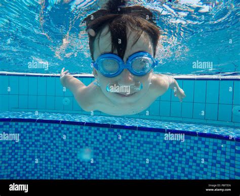 Underwater Little Kid In Swimming Pool With Goggles Stock Photo Alamy