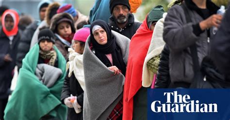 Police Escort Refugees Through Slovenia In Pictures World News The Guardian