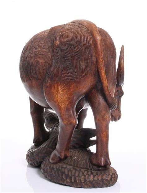 A Large Mid Century Finely Carved Wood Ox With Reeded P