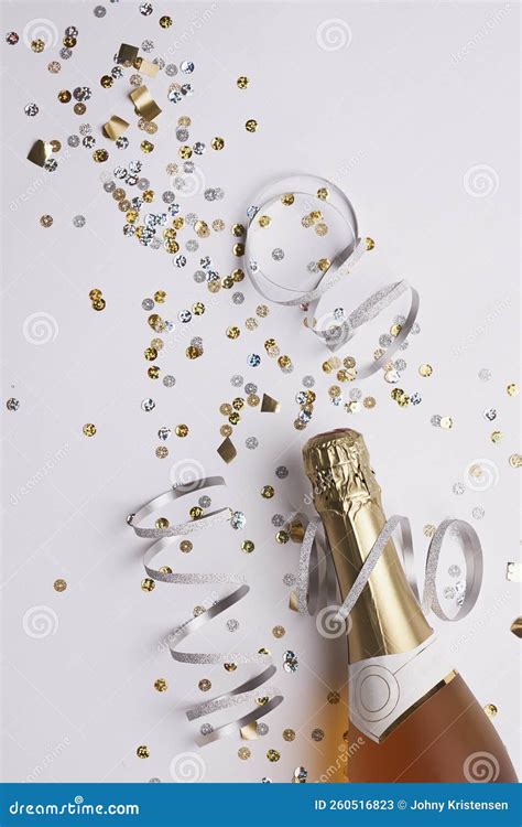 Champagne Bottle With Confetti Ready For The New Year Stock Image