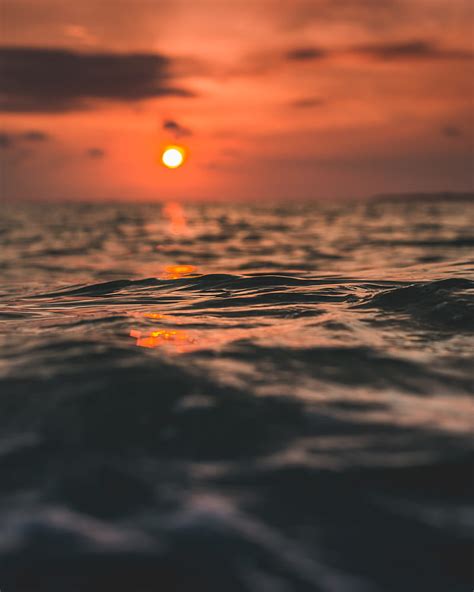 Waves Sun Sunset Water Surface Hd Phone Wallpaper Peakpx