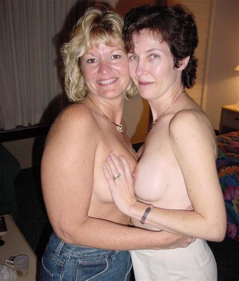 Mature Lesbians Touching Each Others Boobs