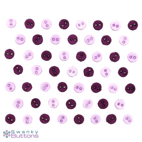 Purple Buttons Are Arranged In Rows On A White Background With The