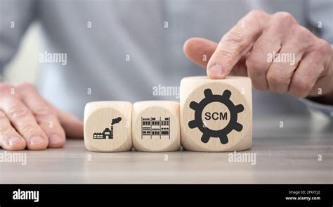 Wooden Blocks With Symbol Of Scm Concept Stock Photo Alamy