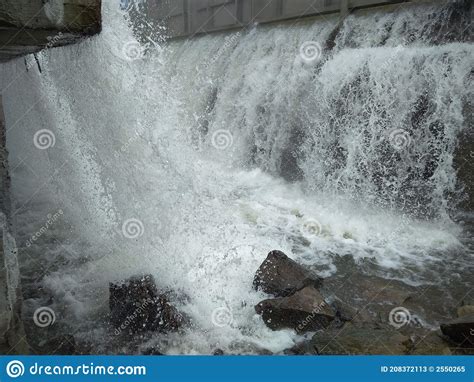 Water Flows Down The Waterfall In The Basement Of The Dam Flood