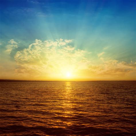 Sunrise Over Water Stock Photos Pictures And Royalty Free Images Istock
