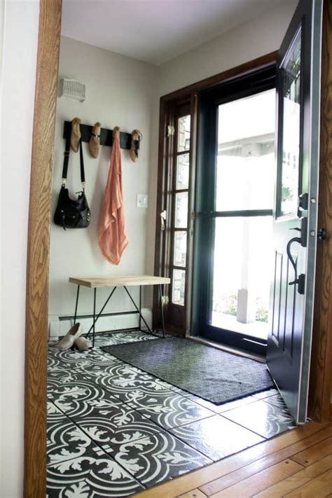 An outer or additional door added for protection against inclement weather. Replacing our Front Door and Storm Door - Bright Green Door