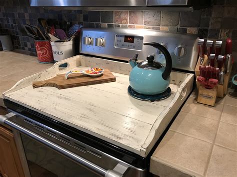 The pilots are small circular devices halfway between the front and. Distressed Noodle Board / Stove Top Cover (With images ...