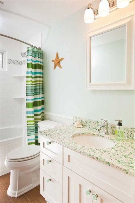 More than one person can use the bathroom at a time. Recycled glass countertops by Dakota surfaces. Bathroom ...