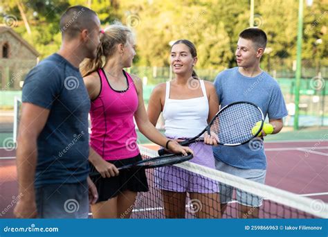 Friendly People Chatting On Outdoor Tennis Court Stock Image Image Of
