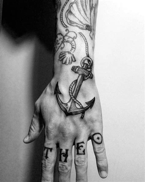 60 Coolest Hand Tattoos For Men Best Hand Tattoos For Guys Fashionterest
