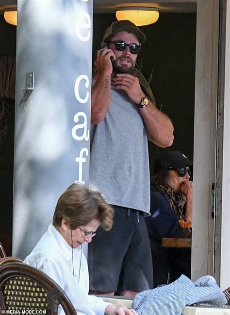Thor Star Chris Hemsworth Shows Off His Bulging Biceps As He Steps Out