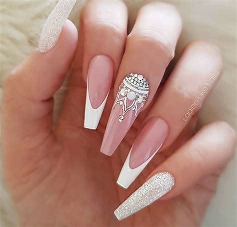 Light Pink Coffin Nails With Diamonds A Playful Look That Can Work