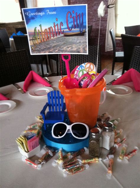here s a beach centerpiece that anyone can diy beach themed party beach centerpieces beach