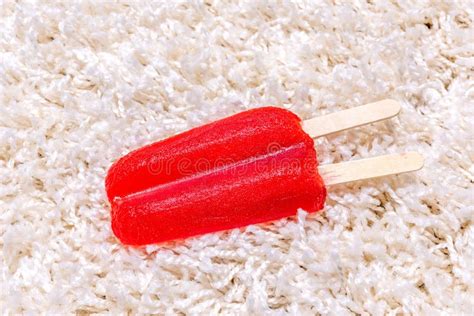 Red Popsicle Melting On Carpet Stock Image Image Of Melt Food 113463645