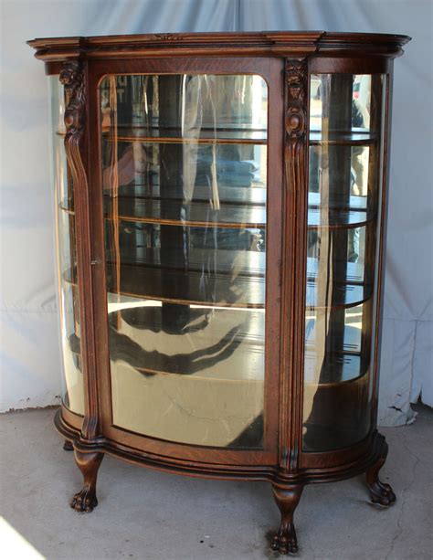 Oak Curved Glass Curio Cabinet With Claw Feet And Lions Head Cabinets