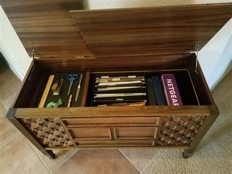 Maybe you would like to learn more about one of these? Vintage stereo cabinet repurposed as an office credenza ...