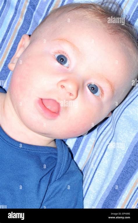 Portrait Of A Blue Eyed Baby Smiling Stock Photo Alamy