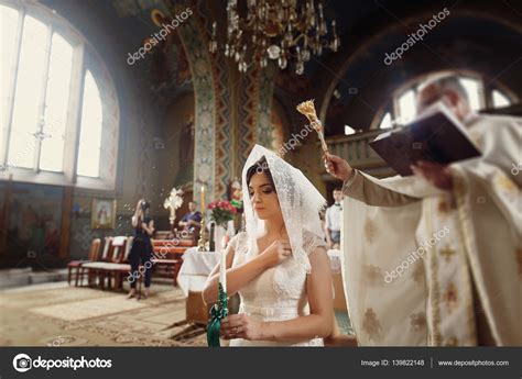 Priest Blessing Gorgeous Bride — Stock Photo © Sonyachny 139822148