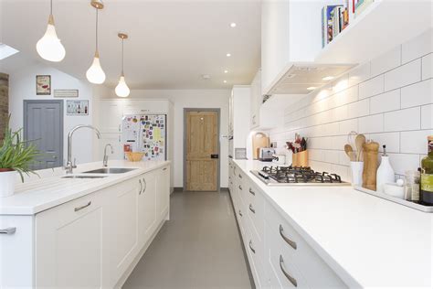 White Shaker Solent Kitchen With Island In A Kitchen With Exposed