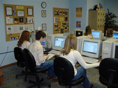 Filestudents Working On Class Assignment In Computer Lab