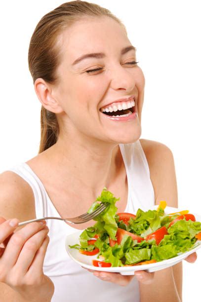 Royalty Free Women Laughing While Eating Salad Pictures Images And
