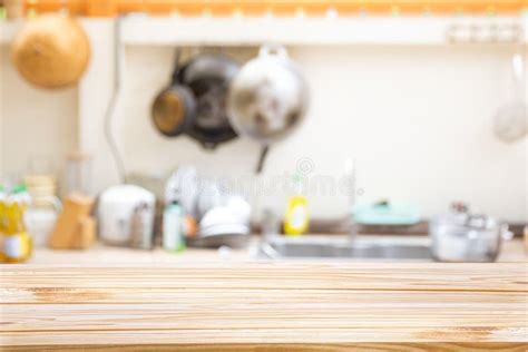 Wooden Board Empty Table In Front Of Blur Image Of Traditional Kitchen