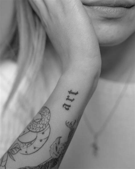 Art Lettering Tattoo On The Wrist