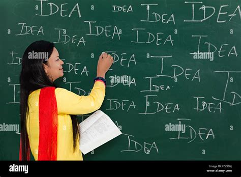 1 Indian Adult Woman Teacher Writing Blackboard Stock Photo Alamy