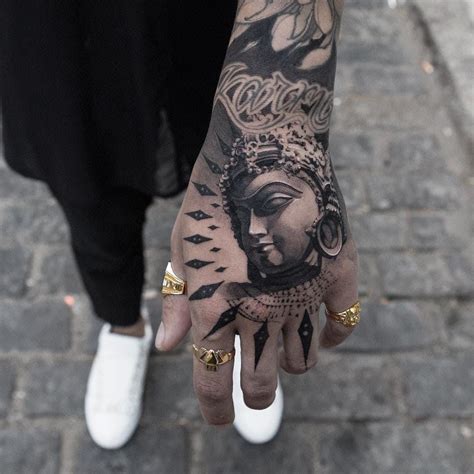 Buddha Tattoo Designs On Hand Small Tattoo Designs