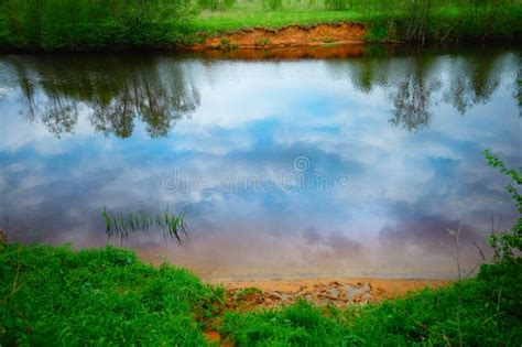 Dramatic Sky Clouds Reflection On River Surface Stock Image Image Of