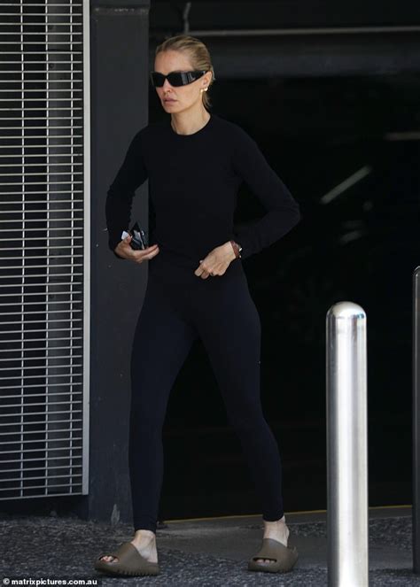 Lara Bingle Shows Off Her Very Slender Figure In A Skintight Outfit As