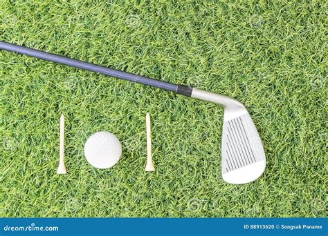 Golf Club And Golf Ball On Green Grass Stock Photo Image Of Field