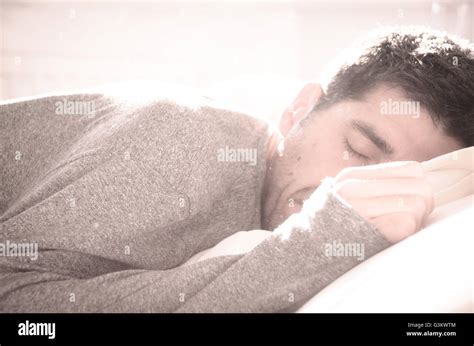 Man Sleeping On Bed Stock Photo Alamy