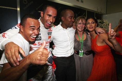 His parents split when was 2 years old. Meet Lewis Hamilton's family, including his laid-off ...