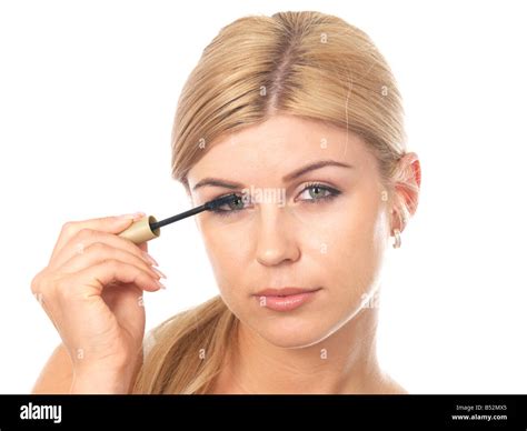 Young Woman Applying Mascara Model Released Stock Photo Alamy