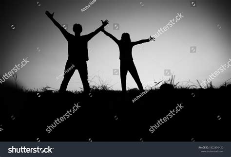 Happy Cheering Couple Enjoying Sunset Stock Photo 1822850420 Shutterstock